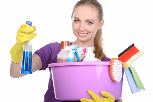Team member following health and safety policy during professional carpet cleaning